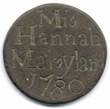 View: ka00009 A bronze halfpenny coin which has been polished on both sides in order to produce a love token; on one side is the name Hannah Maryland with the date 1780, on the other side are the initials I S either side of a simple floral design.