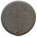 View: ka00012 A bronze George II (probably) halfpenny coin which has been polished on both sides in order to produce a love token; on one side is the name William Sharratt, plus Doveridge, which is almost certainly the place-name; with the 1785, the other side is blank.