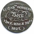 View: ka00016 A bronze George III third-issue halfpenny coin which has been polished on one side in order to produce a memento; on one side is the name Elizabeth Hordern, with the date 24th November 1827 (which was a Saturday) - the letters are of a relatively high standard, and the design has been emphasised by the application of a white substance; the other side has been left in its original, though very worn, state.