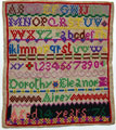 View: ksp00002 An unfinished sampler signed Dorothy Eleanor Airey, aged 14 in 1876; with alphabet and numbers.