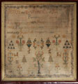 View: ksp00006 A framed sampler signed Jane Wilson in 1805. With religious text and floral motifs.