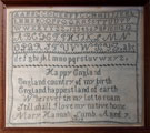 View: ksp00027 A framed sampler signed Mary Hannah Lumb 1864. Alphabet and numbers, poetic verse 'Happy England'.