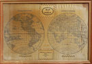 View: ksp00035 A framed sampler of the globe illustrating eastern and western hemisphere, continental outline, place names, latitude and longitude. Satin ground, silk thread, straight stitch.