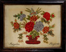View: ksp00043 A framed woolwork embroidery signed Maryellen Haigh 1868; depicts flowers in a vase.