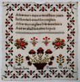 View: ksp00075 An unframed sampler signed Miss Sarah Jane Pogson between1840 and 1870. With moral verse, surrounded by floral border.