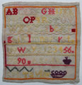 View: ksp00081 An unframed needlework sampler, signed S.M. Taylor, aged 9, (c. 1881); Ch. Ch. School; alphabet and numbers.