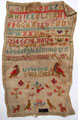 View: ksp00087 An unframed sampler signed by 'S.W.', aged 12; dated 1834. with an alphabet, birds, flowers and two dogs.